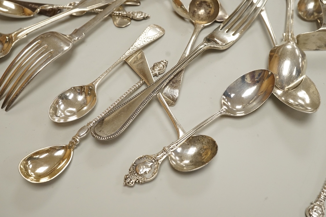 A small collection of assorted mainly 19th century silver flatware, including teaspoons, dessert forks, condiment spoons, serving spoon, etc. various dates and makers, 21.6oz.